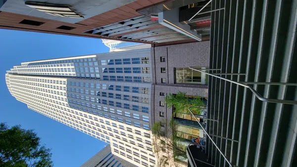 Bank of America renews broad employee stock awards as shares set records and profits rise sharply